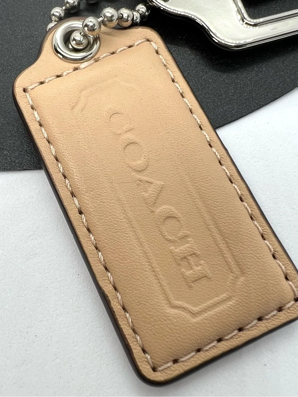 COACH Beige Leather Silver Logo 3 Piece Bag Charm Keychain Hang Tag Set